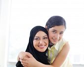 stock photo of family  - Muslim Arabic mother and daughter - JPG 