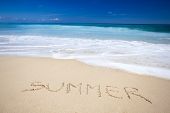image of beach  - Beautiful tropical beach with the word summer written on the sand - JPG 