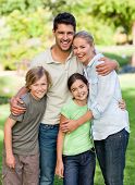 foto of family  - Happy family in the park - JPG 
