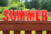 stock photo of spell  - Summer spelled in letters cut out of watermelon - JPG 