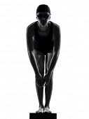 picture of competition  - one caucasian woman competition swimmer on starting in silhouette studio isolated on white background - JPG 