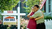 stock photo of home  - A young couple purchases a new home from a real estate agent - JPG 