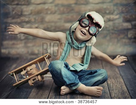 Picture or Photo of A small boy playing