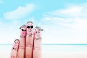 picture of member  - Fingers gesturing as family members that travels at the beach - JPG 