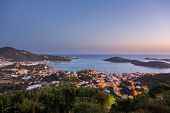 pic of sunset  - Sunset over the harbor of Charlotte Amalie in St Thomas with view over town and yachts in bay - JPG 