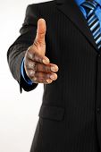 picture of handshake  - This is an image of business man offering a handshake - JPG 