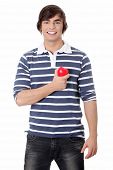 stock photo of bloodpressure  - Young man with heart - JPG 