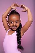 foto of africans  - Portrait of a cute little African American girl dancing - JPG 