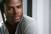 stock photo of black  - African american cute black young man closeup portrait - JPG 