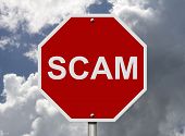 foto of fraud  - An American road stop sign with word fraud with clouds and sky Help stop Scam - JPG 