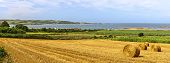 stock photo of france  - Straw Bales Panorama near the Sea in Normandy France - JPG 
