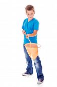 foto of net  - School aged boy looking at the butterfly net - JPG 