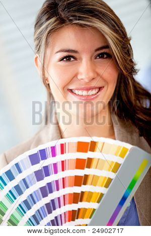 Picture or Photo of Interior designer with a color palette ready to decorate