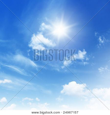 Picture or Photo of Blue sky with clouds and sun.