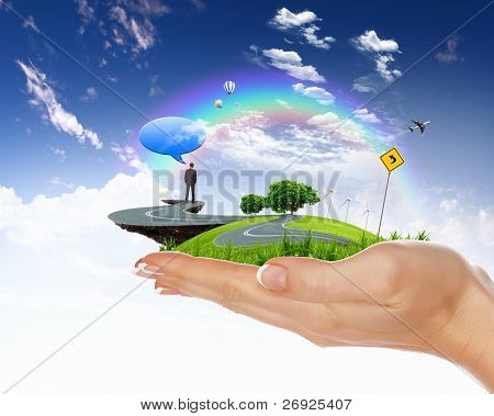 Picture or Photo of Collage with a human hand holding a green landscape
