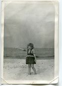 pic of  photo  - Vintage unretouched photo of young girl on beach - JPG 