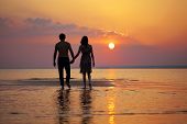 image of sunset  - The image of two people in love at sunset - JPG 