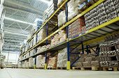 foto of food  - long stack arrangement of goods in a wholesale and retail warehouse depot - JPG 