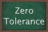 picture of zero  - A chalkboard with the chalk letters zero tolerance Zero Tolerance Policy at schools - JPG 