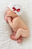 picture of infants  - Newborn Christmas baby girl asleep on a blanket - JPG 